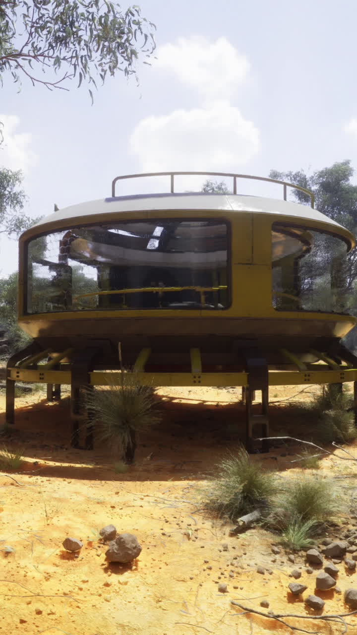 Modern circular building surrounded by nature in a remote landscape