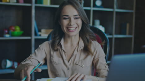 Successful-business-woman-smiling.-Happy-woman-enjoy-success-work-on-laptop