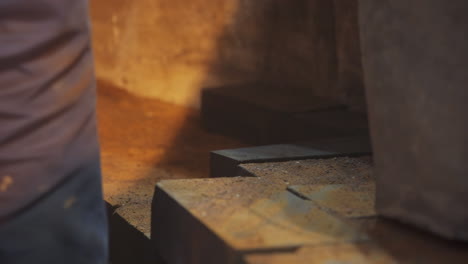 blacksmith working in a forge