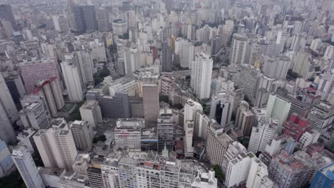 high aerial tilt: monochromatic hazy city skyline of sao paulo, brazil