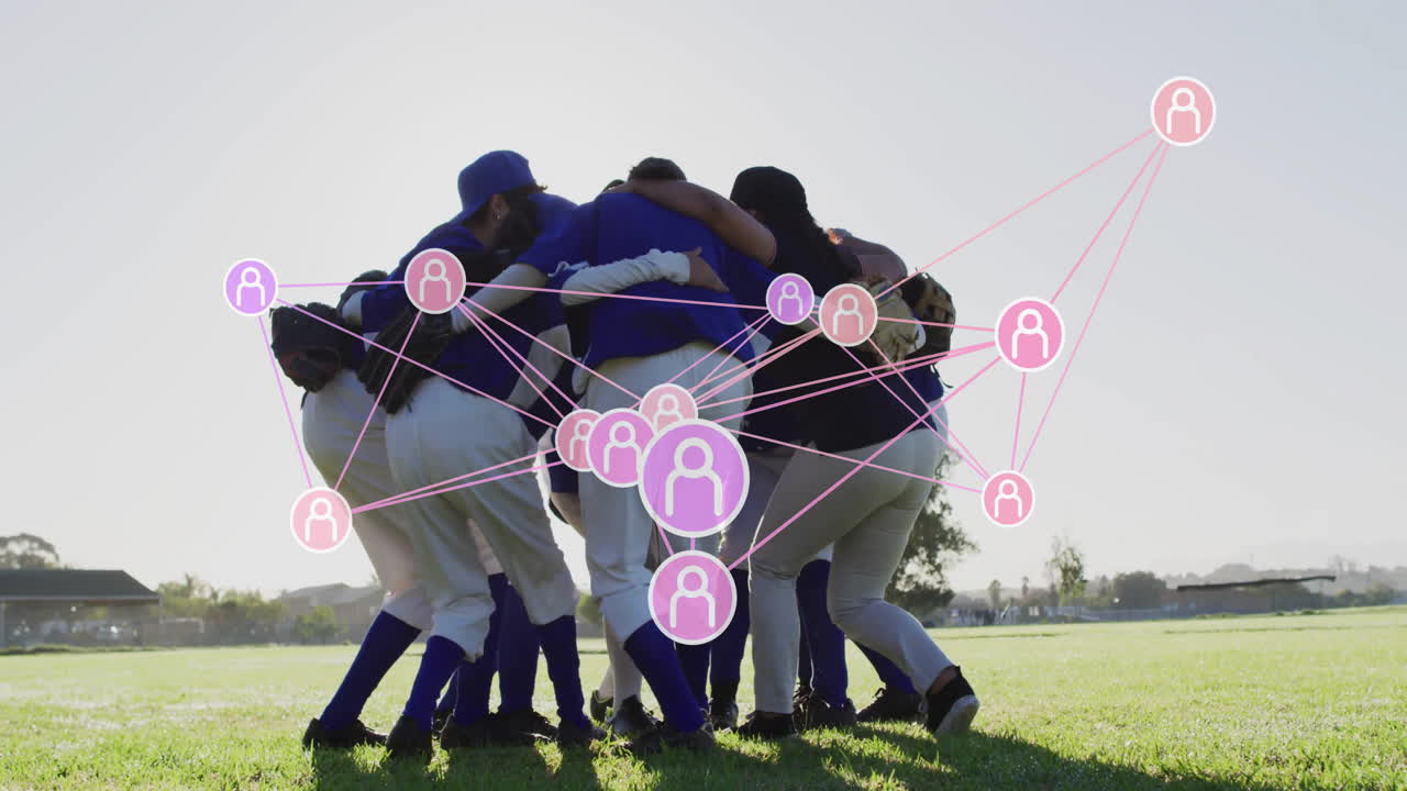 female baseball team gathering in huddle on field for health training with floating glove icons