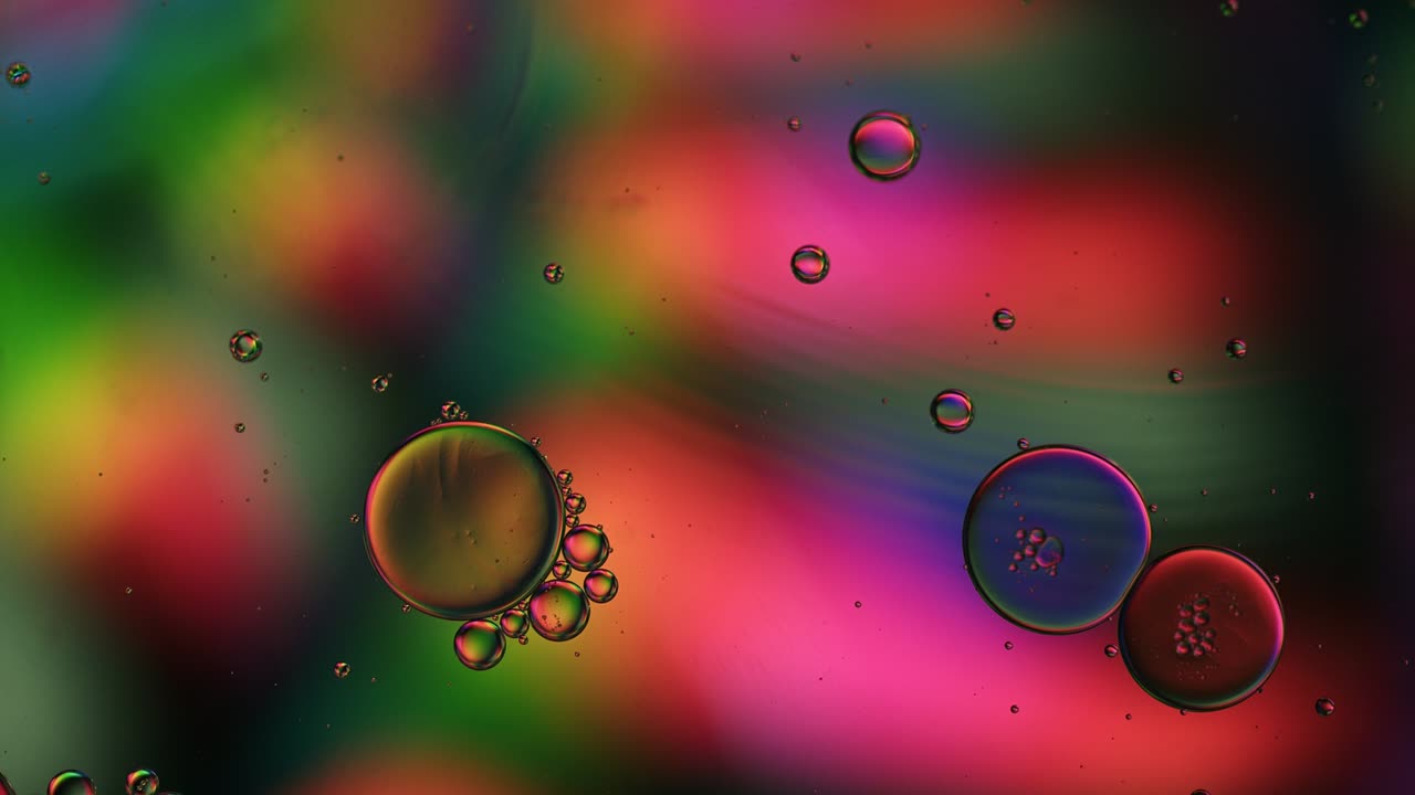Abstract Colorful Food Oil Drops Bubbles and spheres Flowing