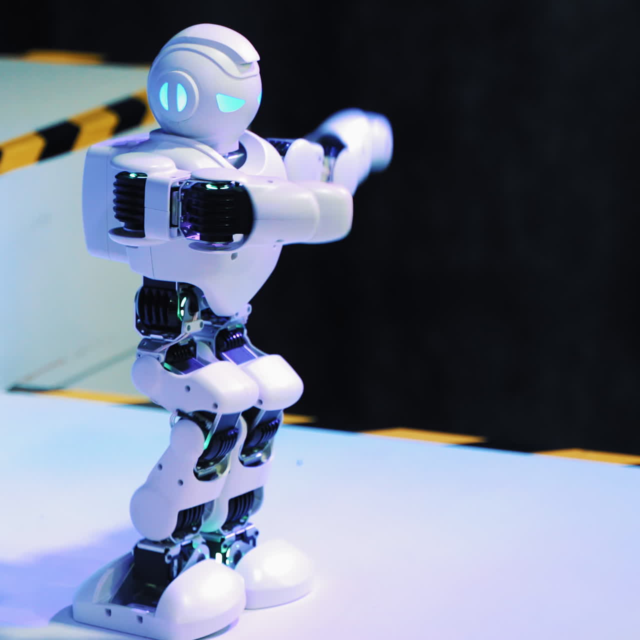 Robot dancing and moving at technology exhibition. Future and robotic concept. Smart Robot