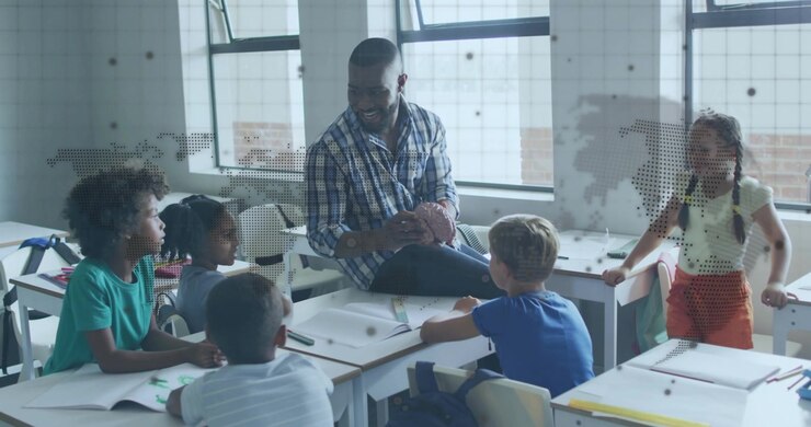 Teacher turning brain model in classroom, showing animated lobes while students sketching outlines