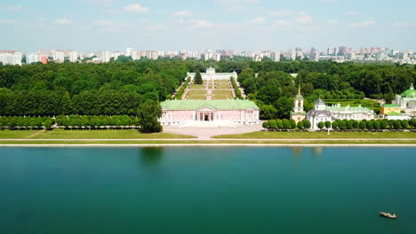 aerial view of a palace and garden in a european city