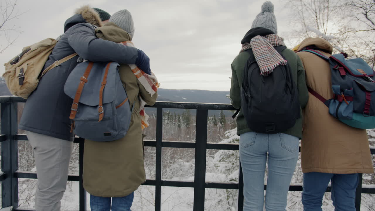 Friends Enjoying a Snowy Winter Hike