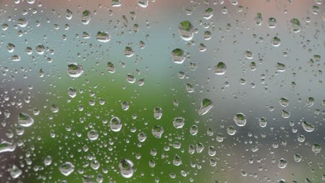 vidrio de ventana con gotas de lluvia tiempo macro video 4k