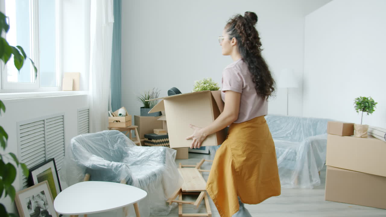 Woman Moving Home