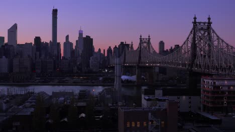 evening shot of the new york city skyline and the queensboro bridge 1