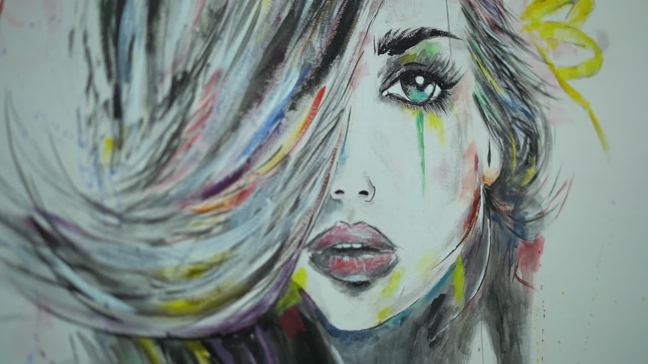 View of a beautiful girl paint on a wall, close up shot,