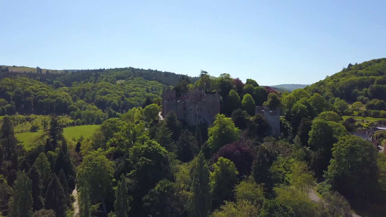 Aerial view of the Dunster castle and the surrounding gardens, Somerset, England.