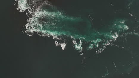 danger and beauty in speeding water current, saltstraumen strait