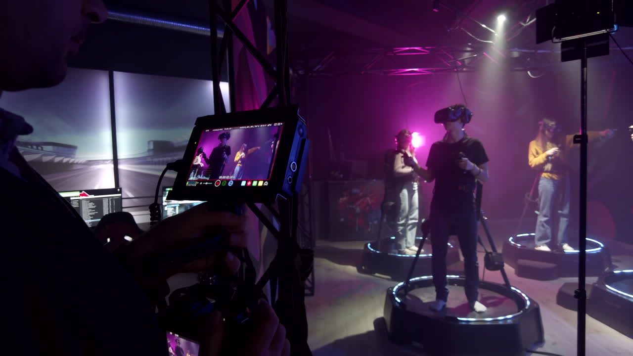 Camera filming a boy playing with a Virtual Reality headset