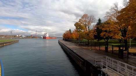 Sailing-through-Soo-Locks-in-Saulte-Ste-Marie,-Michigan