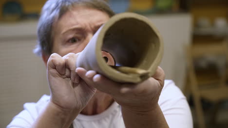 woman crafting pottery