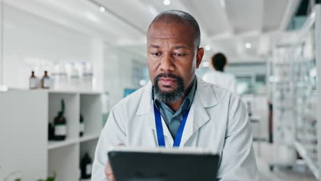 scientist using tablet in lab