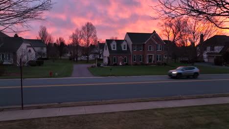 Large-home-in-USA-upscale-neighborhood-at-colorful-sunrise