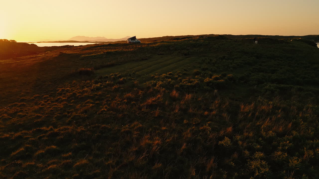Sunset over a Scottish Isle with Sheep and Van