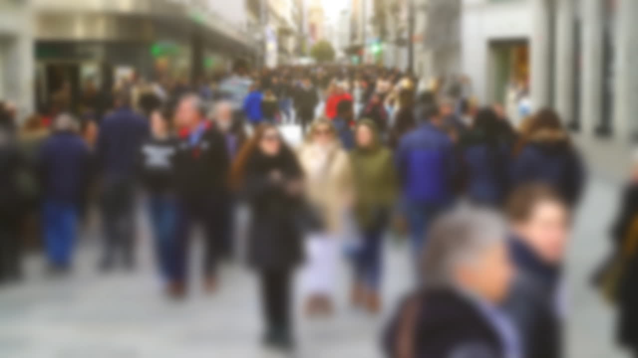 People on Calle del Carmen Street. Madrid, Spain. Out of focus. Time lapse. Calle del Carmen Street, near Puerta del Sol Square. Timelapse. Madrid, Spain