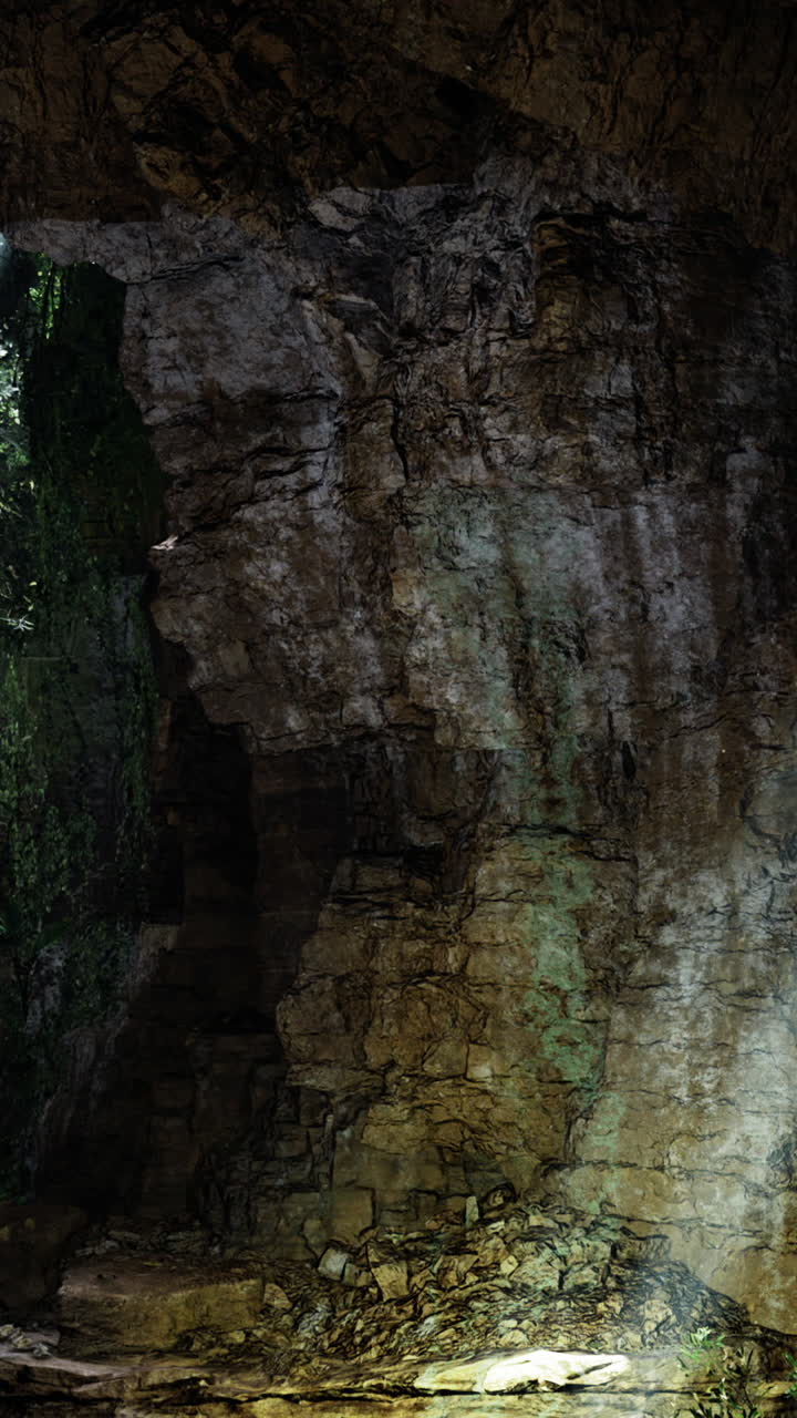 Stunning light rays illuminating a lush cave interior in a natural setting