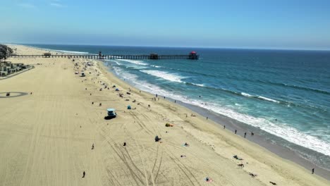 hyperlapse flying towards the pier in huntington beach california