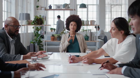 young-mixed-race-business-woman-executive-meeting-corporate-leaders-discussing-development-ideas-with-shareholders-brainstorming-in-office-boardroom