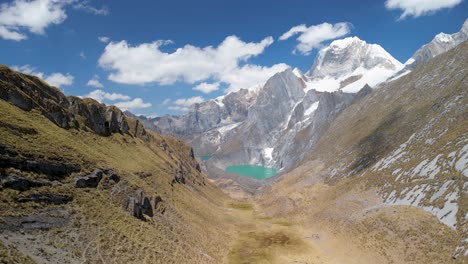 flying through a dramatic valley on the scenic huayhuash trek, capturing glacial lakes, steep peaks, and wild peruvian andes landscapes