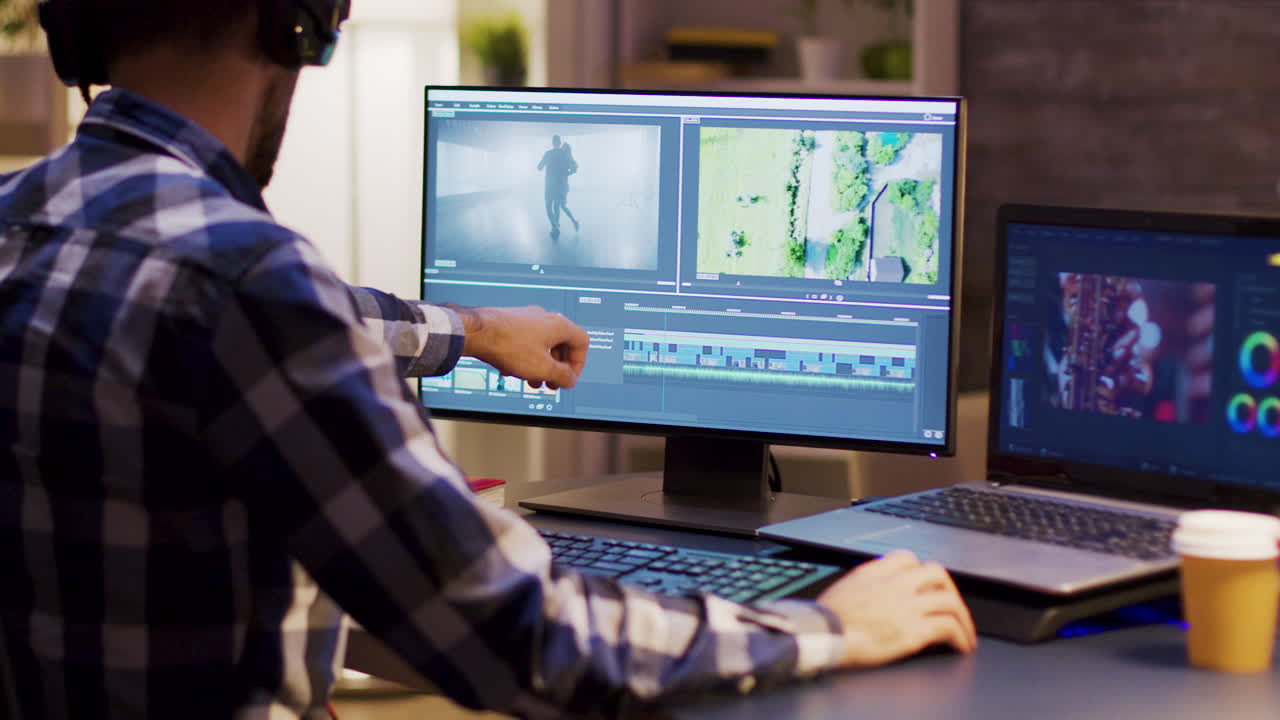 A person doing video editing on a computer
