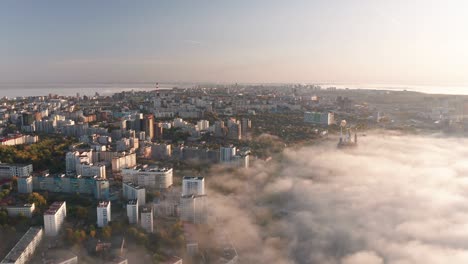 aerial footage of the beautiful city with buildings, forest, mosque and riverside on background. the best views of ufa city.