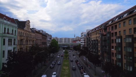 flock of pigeons flies, perfect aerial top view flight
city berlin suburban railroad station prefabricated building skyscrapers district neukoeln, germany summer day 2023