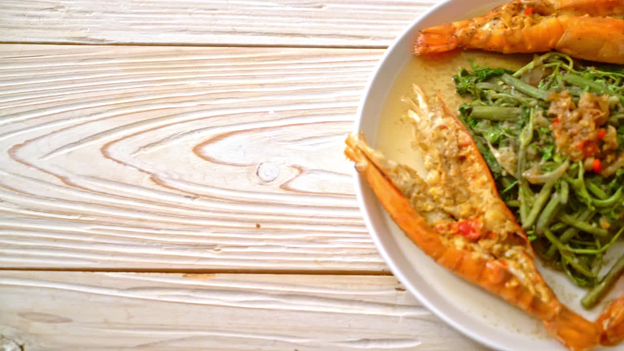 Stir-fried water mimosa with river prawns