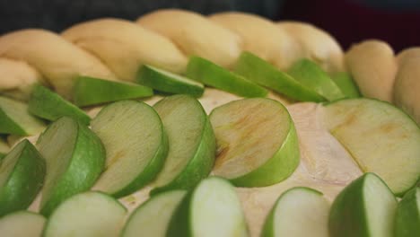 apple slices arranged over braided pastry