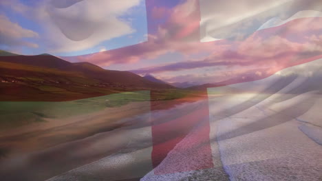 animación de la bandera de inglaterra ondeando sobre el paisaje de la playa