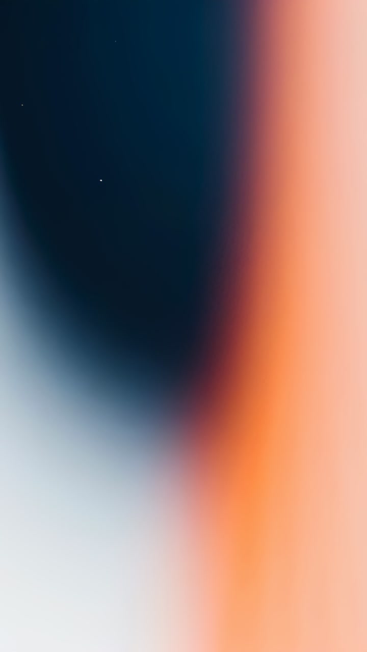 Vertical video: Shifting lens nudging color band in abstract closeup, showing navy and peach tones