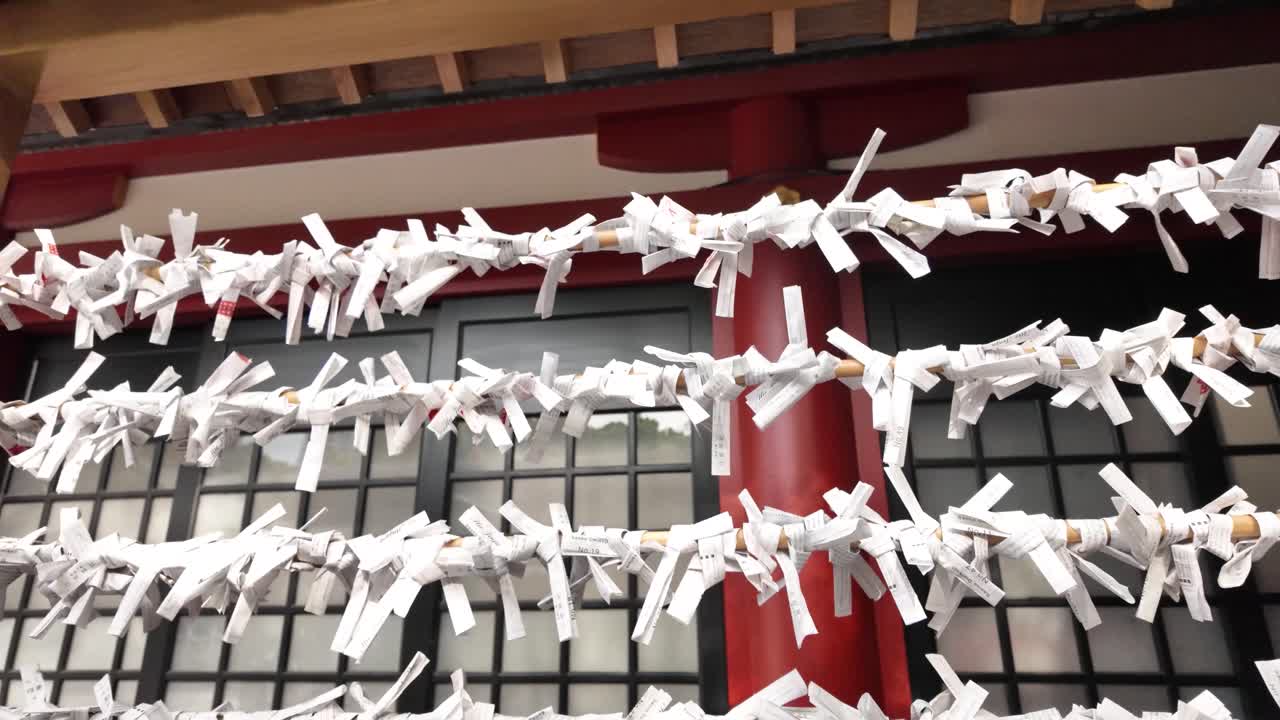 Fortune-telling paper strips Omikuji fortune Hie Shrine traditional Tokyo Japan heritage