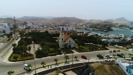 Aerial-view-around-the-Iglesia-La-Resurrección-del-Señor-church-San-Bartolo,-in-sunny-Peru