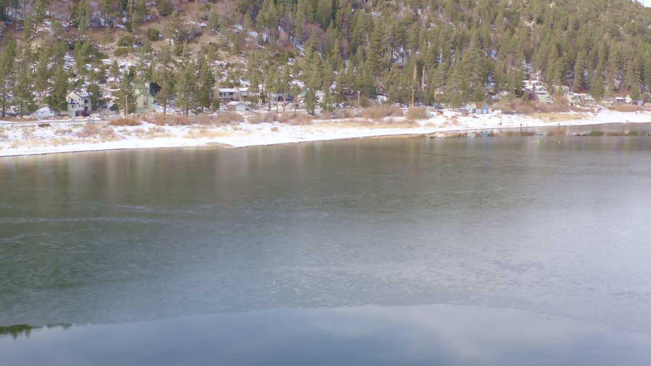 BigBear Lake flyby over ice snow trees