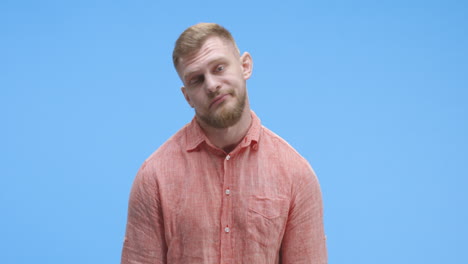 man with a questioning expression