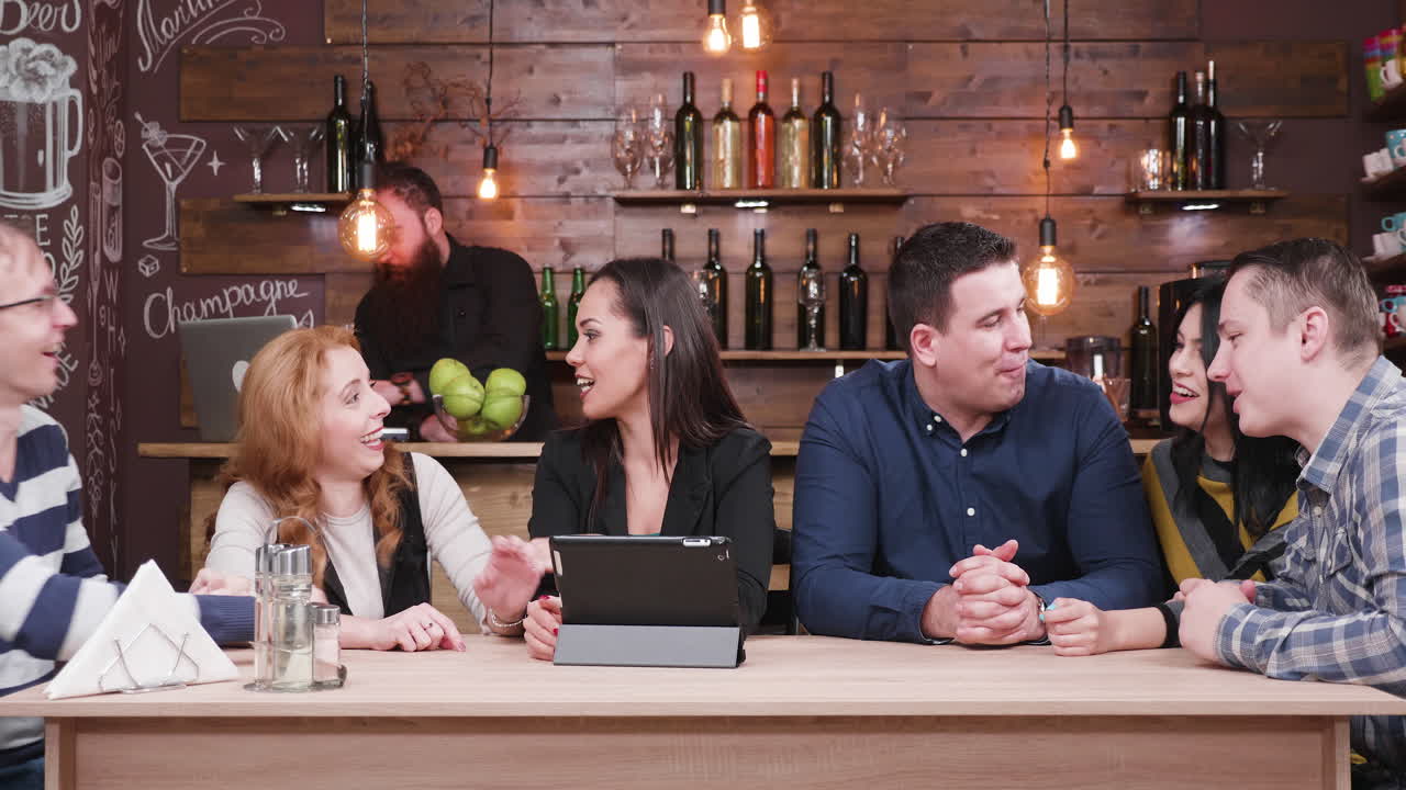 A group of friends in a bar