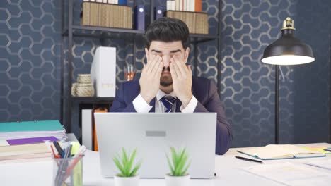 businessman whose eyes are tired from work. sleepless and tired.