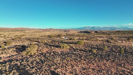 flying over arid deserts with motorhome in moab countryside nature park, usa