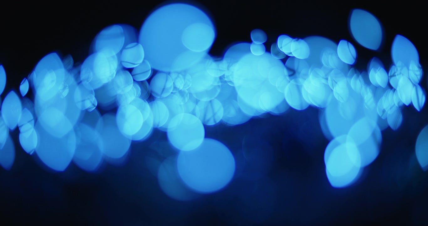 Bakgrunn med vakre blå bokeh-kuler