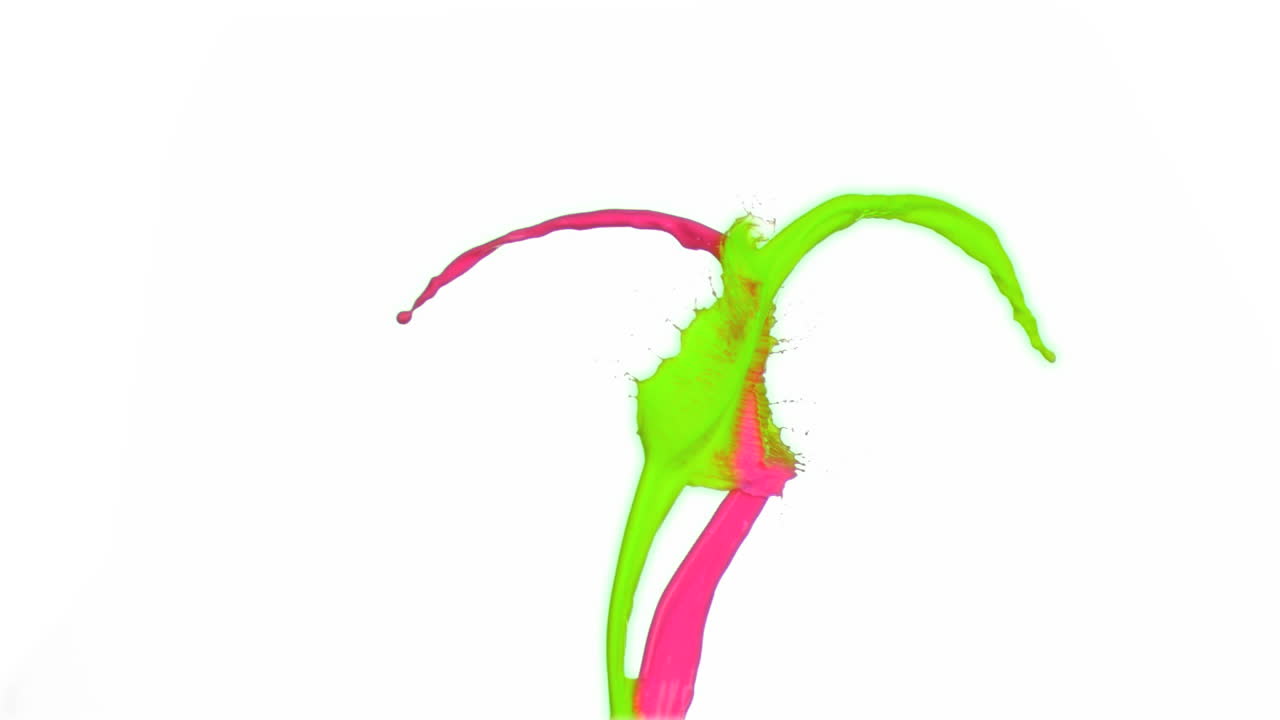 Multicolored sprays of paint in super slow motion rising