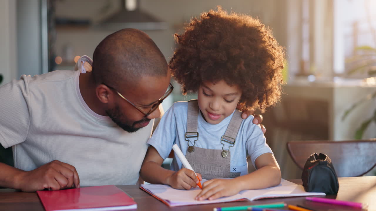 Father helping child with homework