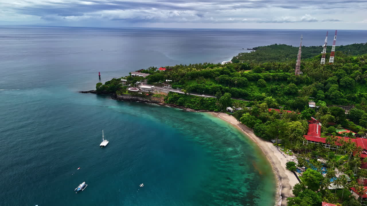 Aerial view of a storm approaching Senggigi Beach, captured by drone
