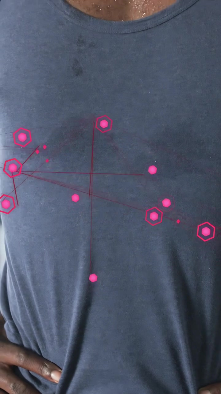 Vertical video: Man pulling navy tank releasing and engaging pink hex nodes overlay for IT tracking