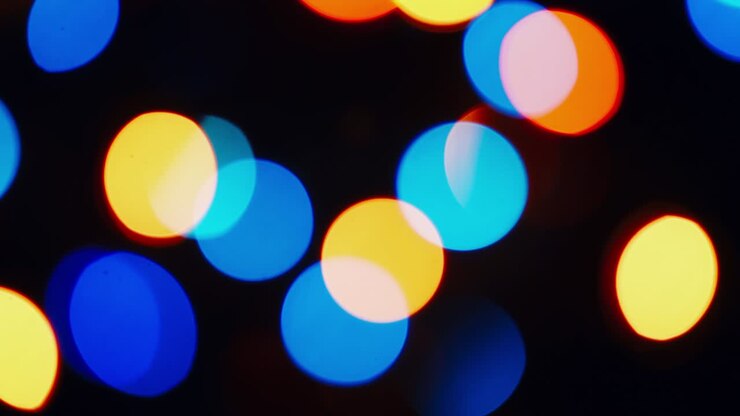 Sfondo astratto con luci scintillanti natalizie a bokeh circolare