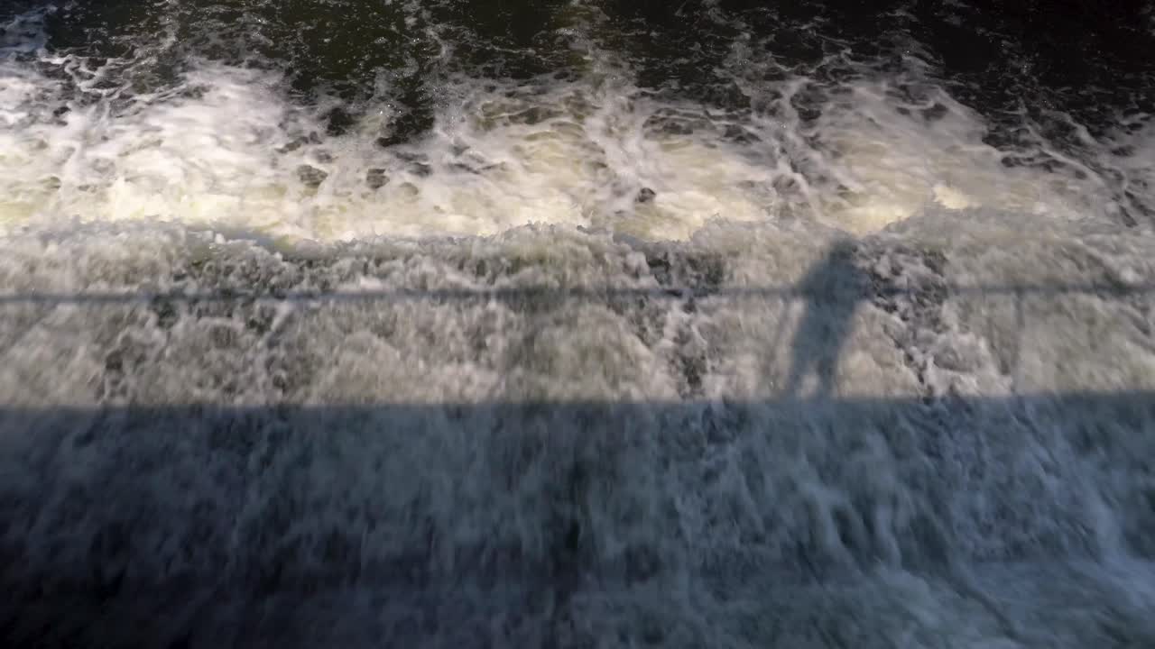 dam in rockford michigan waterfall flowing water