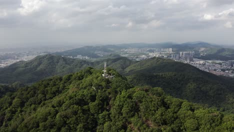 aerial: baiyun mountain on outskirts of guangzhou chinese city, 4k view