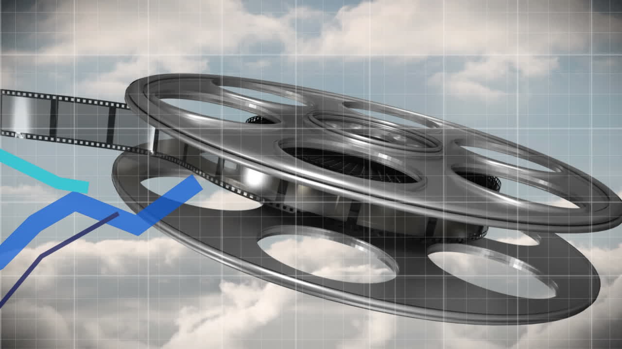 파란 하늘을 반대하여 움직이는 필름과 그래프의 스풀